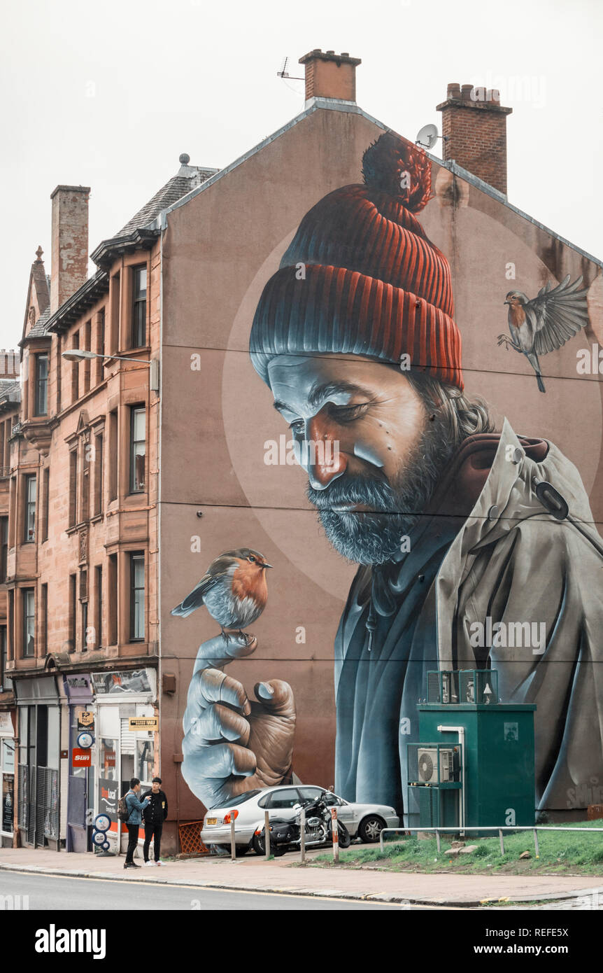 Mural of St Mungo by Smug in Glasgow. Stock Photo