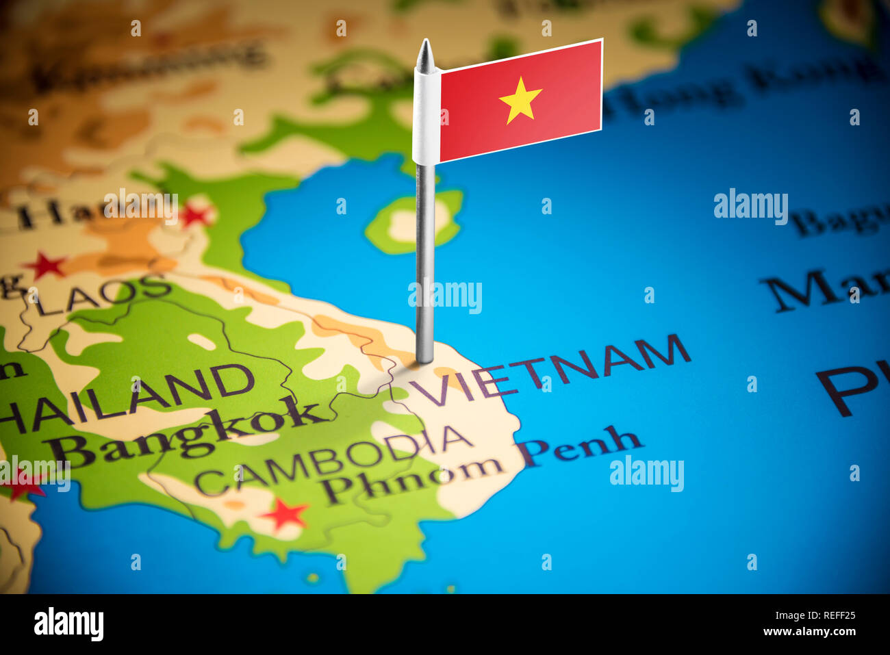 Vietnam marked with a flag on the map Stock Photo Alamy