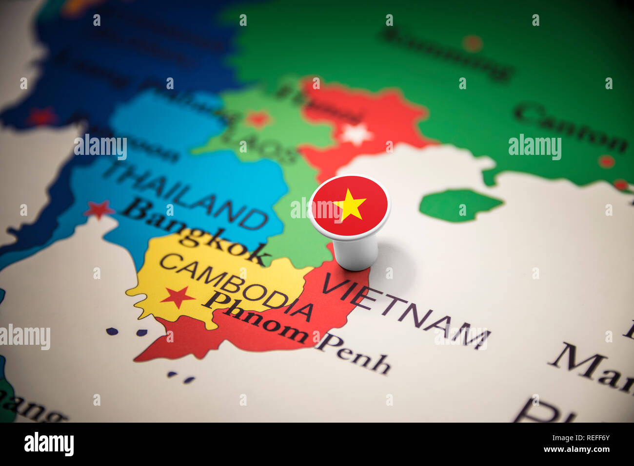 Vietnam marked with a flag on the map Stock Photo - Alamy