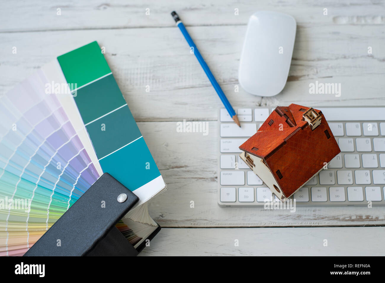 Top view of Architect & Interior designer working table with color palette/ home renovation concept - Image Stock Photo