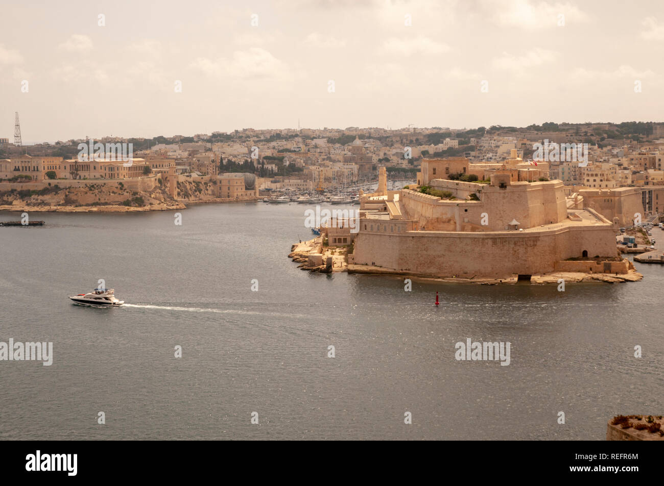 View over the Grand Harbour and Fort St. Angelo from Upper Barrakka Gardens in Valletta, Malta. Stock Photo
