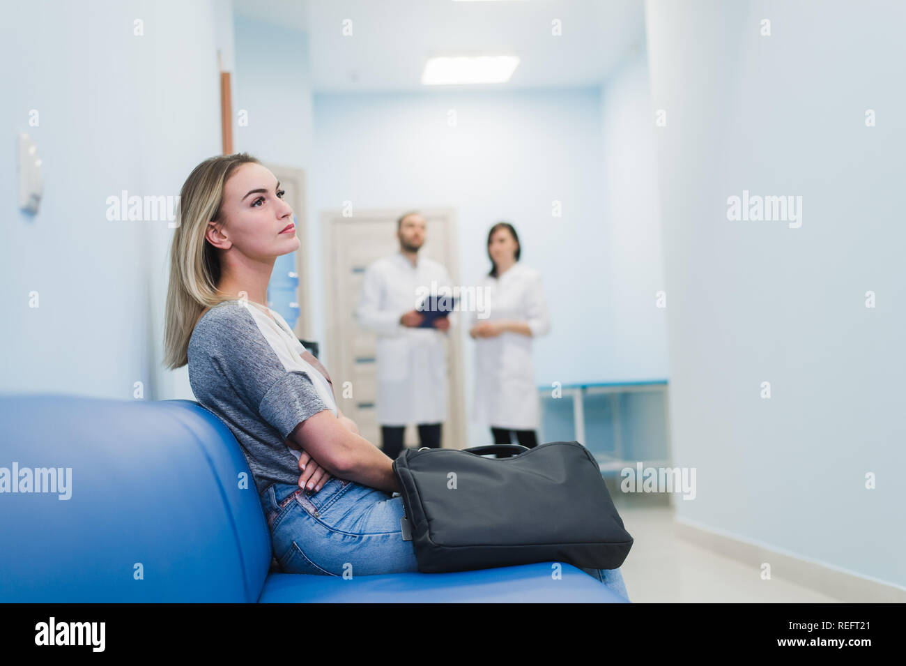 Woman hospital gown waiting hi-res stock photography and images - Alamy
