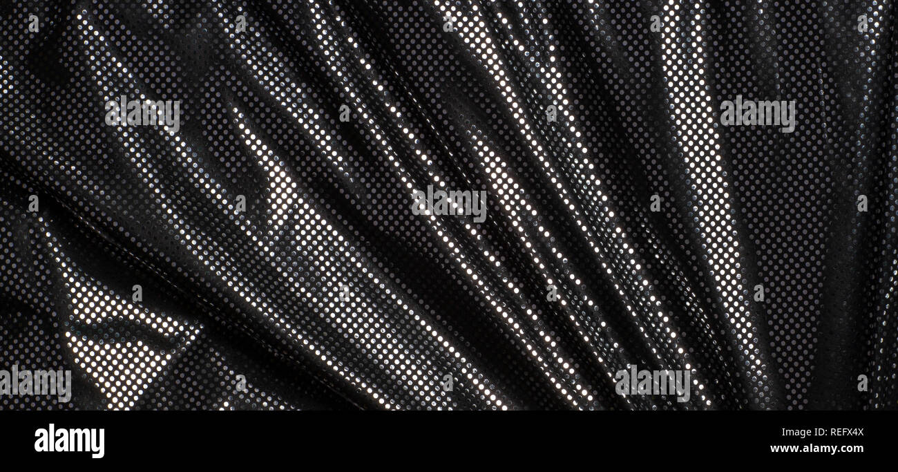 Gray black metalic silver polka dot fabric texture background Stock Photo