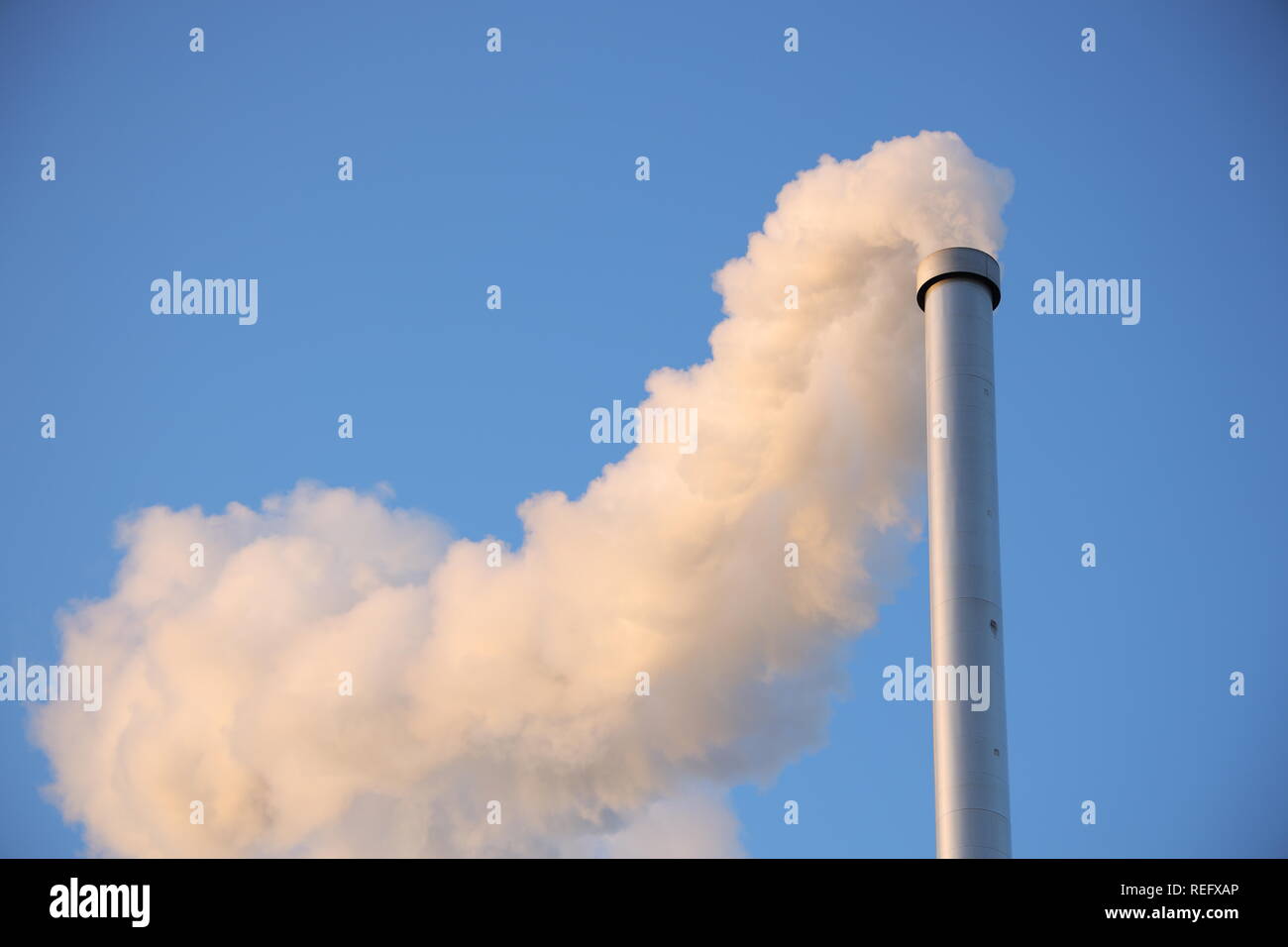 Smoke coming out of a chimney Stock Photo Alamy