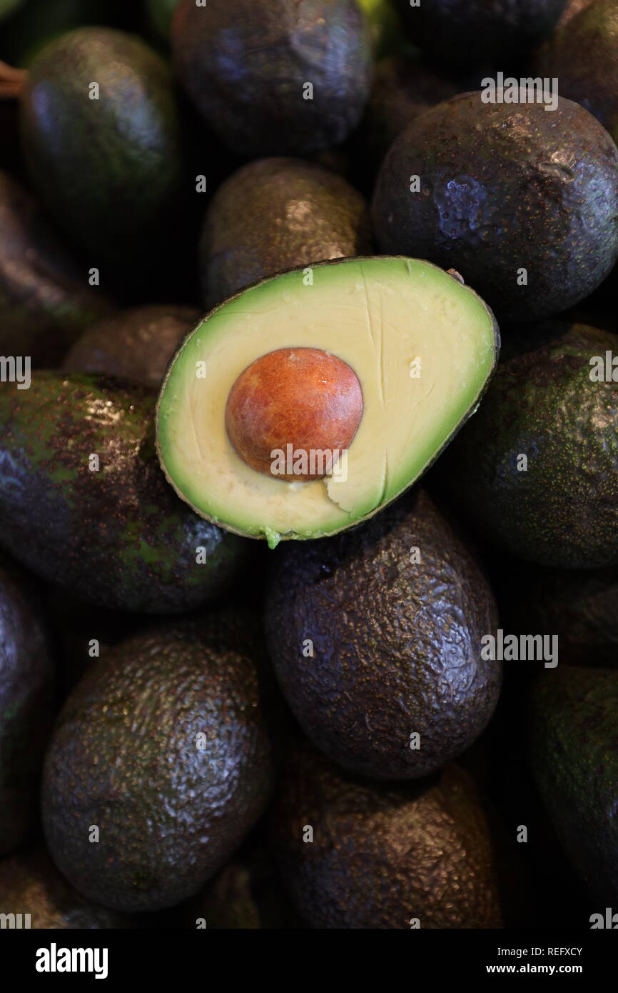 Avocado pear cut with seed. Stock Photo