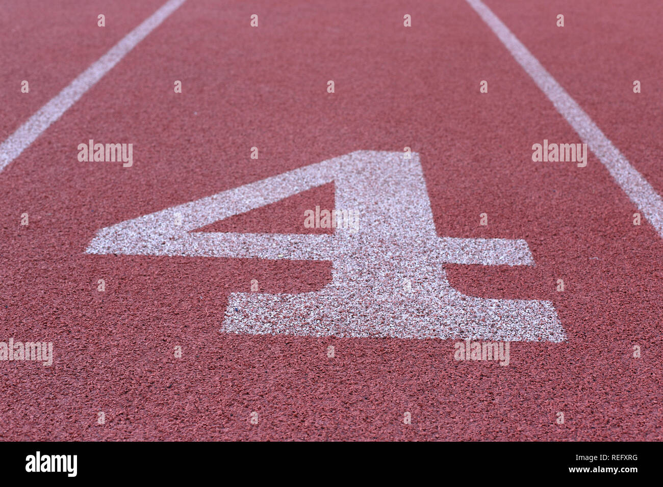 Track and Field Race Course Lane 4 Stock Photo