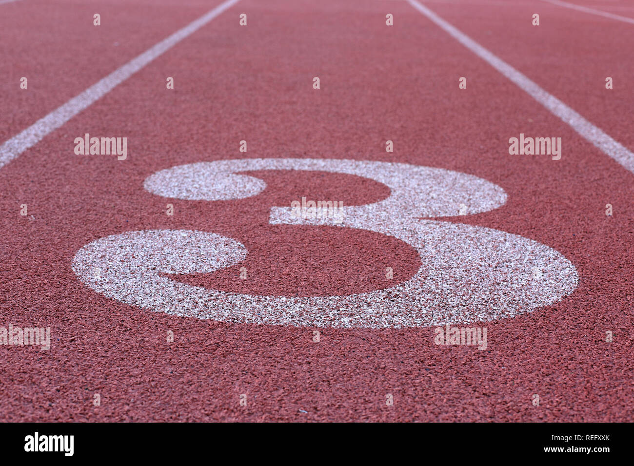 Track and Field Race Course Lane 3 Stock Photo