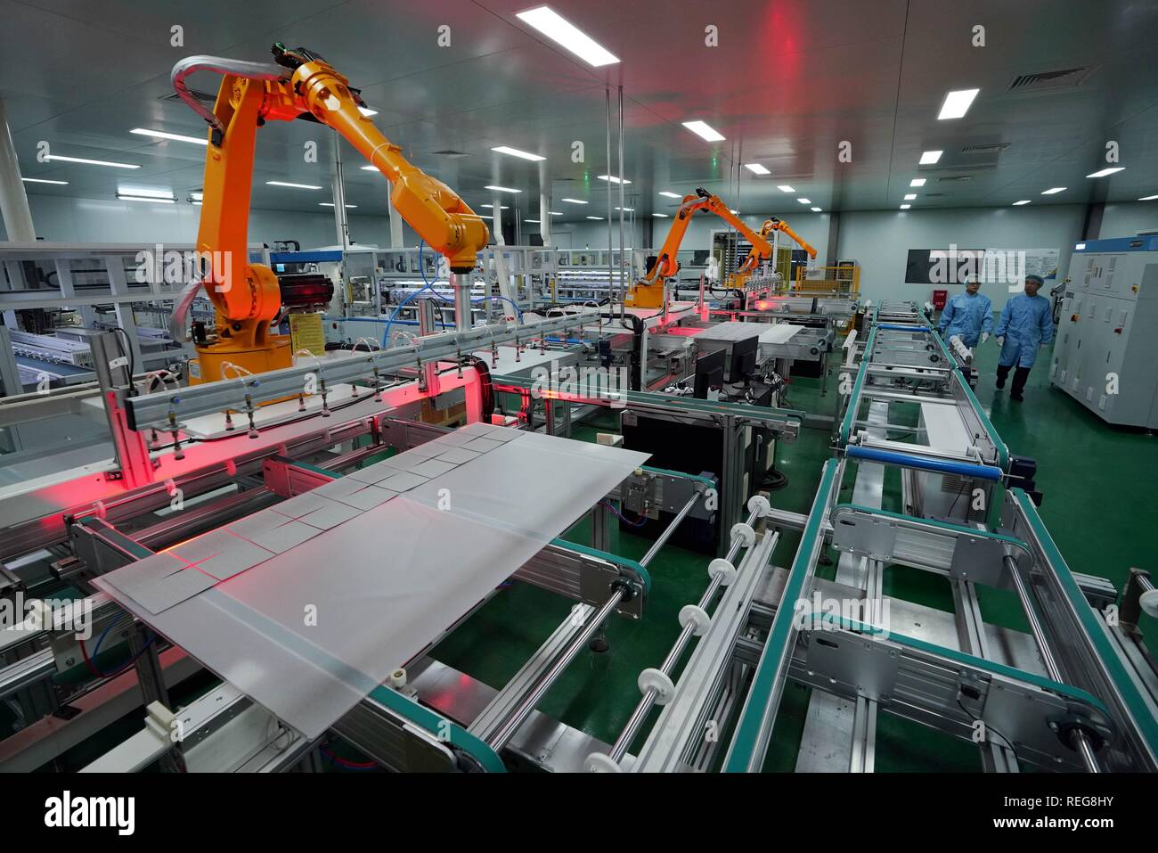 (190122) -- BEIJING, Jan. 22, 2019 (Xinhua) -- Photo taken on Dec. 11 shows the photovoltaic module production line of a company in De'an County, east China's Jiangxi Province. China's economy grew 6.6 percent year on year in 2018, beating the official annual target of around 6.5 percent, data from the National Bureau of Statistics (NBS) showed Monday.    The country's gross domestic product (GDP) hit 90.03 trillion yuan (about 13.32 trillion U.S. dollars) in 2018. The following are a group of facts and figures released by the NBS on its solid economic performance last year.    -- China's fixe Stock Photo