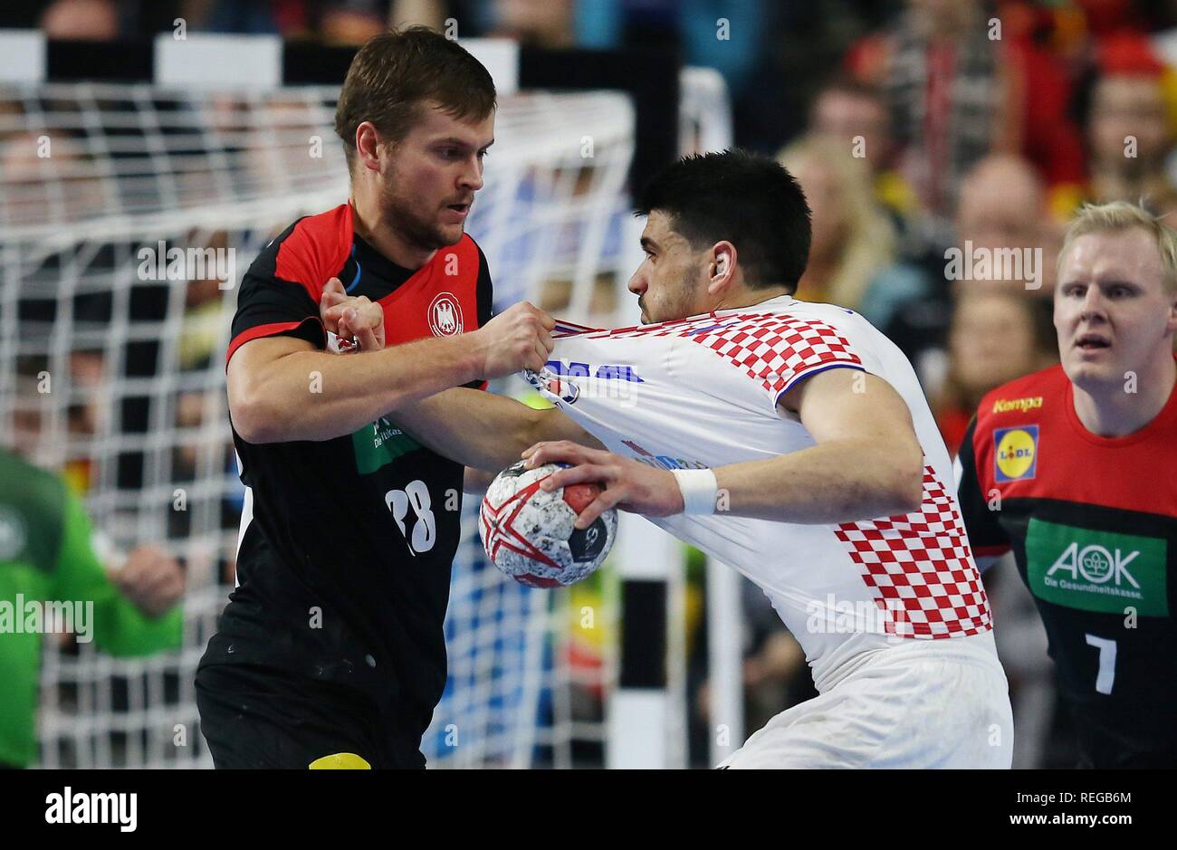 Cologne, Deutschland. 21st Jan, 2019. firo: 21.01.2019, Handball: World Cup  World Cup Main Round Croatia Croatia - Germany 21:22 duels, jersey, joke  humor, Fabian Bohm vs Domagoj Stepancic, re, CRO | usage