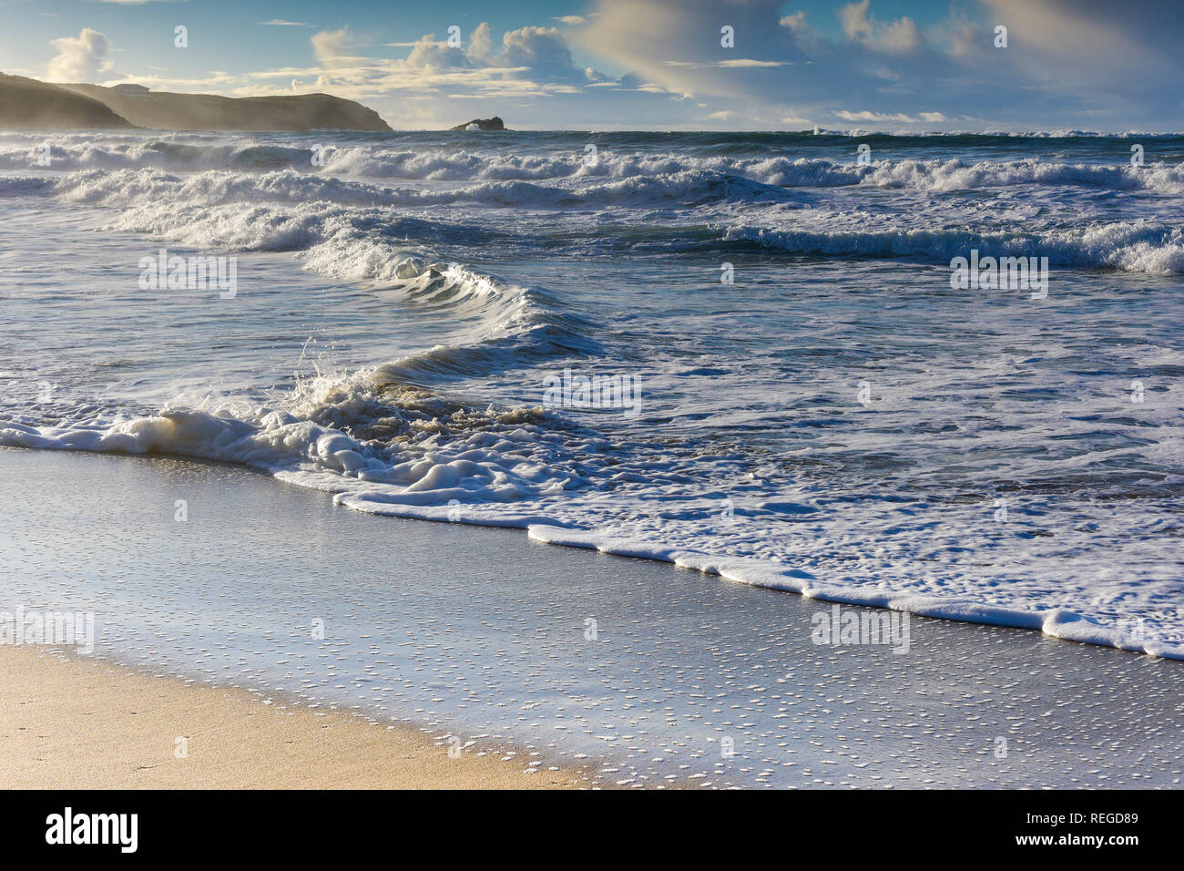 Early evening sunlight over Fistral Beach in Newquay Cornwall. Stock Photo