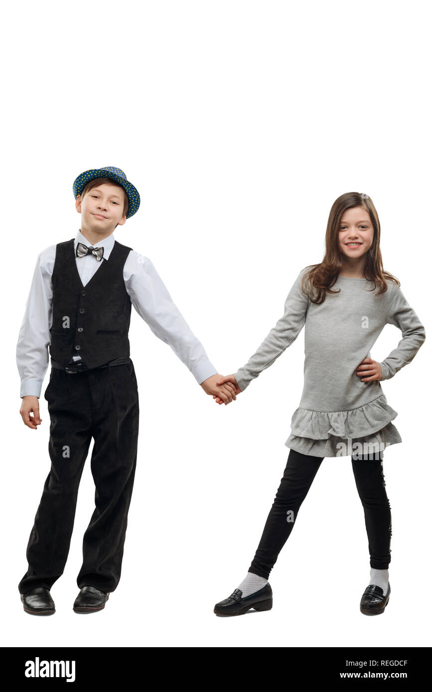 Boy and girl holding hands Stock Photo - Alamy