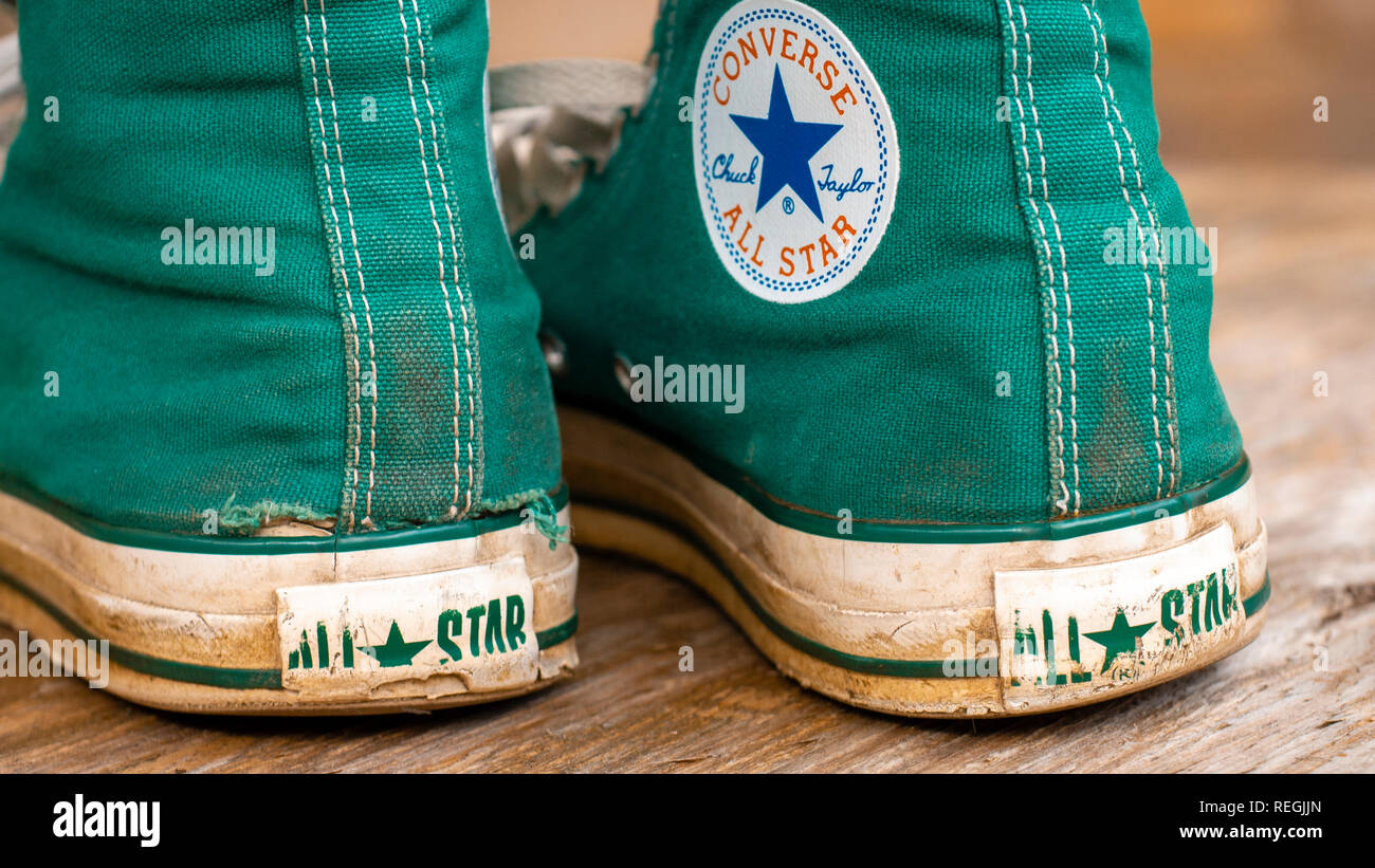 Pair of Converse Basketball Boots in worn condition, Converse is an  American shoe company founded in 1908 Stock Photo - Alamy