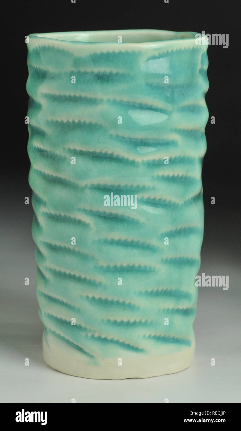 Jade porcelain embossed ceramic glazed beakers Stock Photo