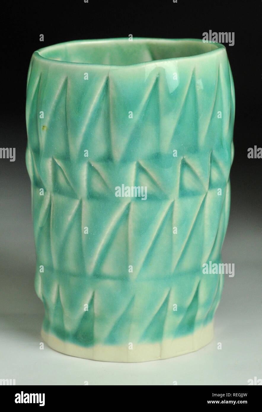 Jade porcelain embossed ceramic glazed beakers Stock Photo Alamy