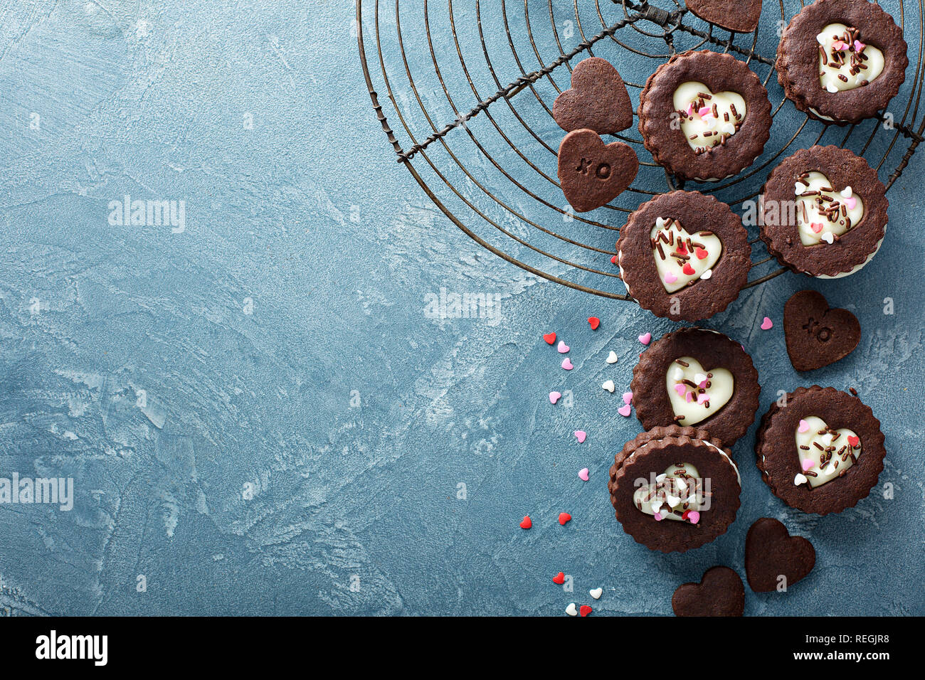 Heart Shaped Chocolate Cookies With Cream Filling For Valentines Day On A Baking Rack Sweet Treats Background Stock Photo Alamy