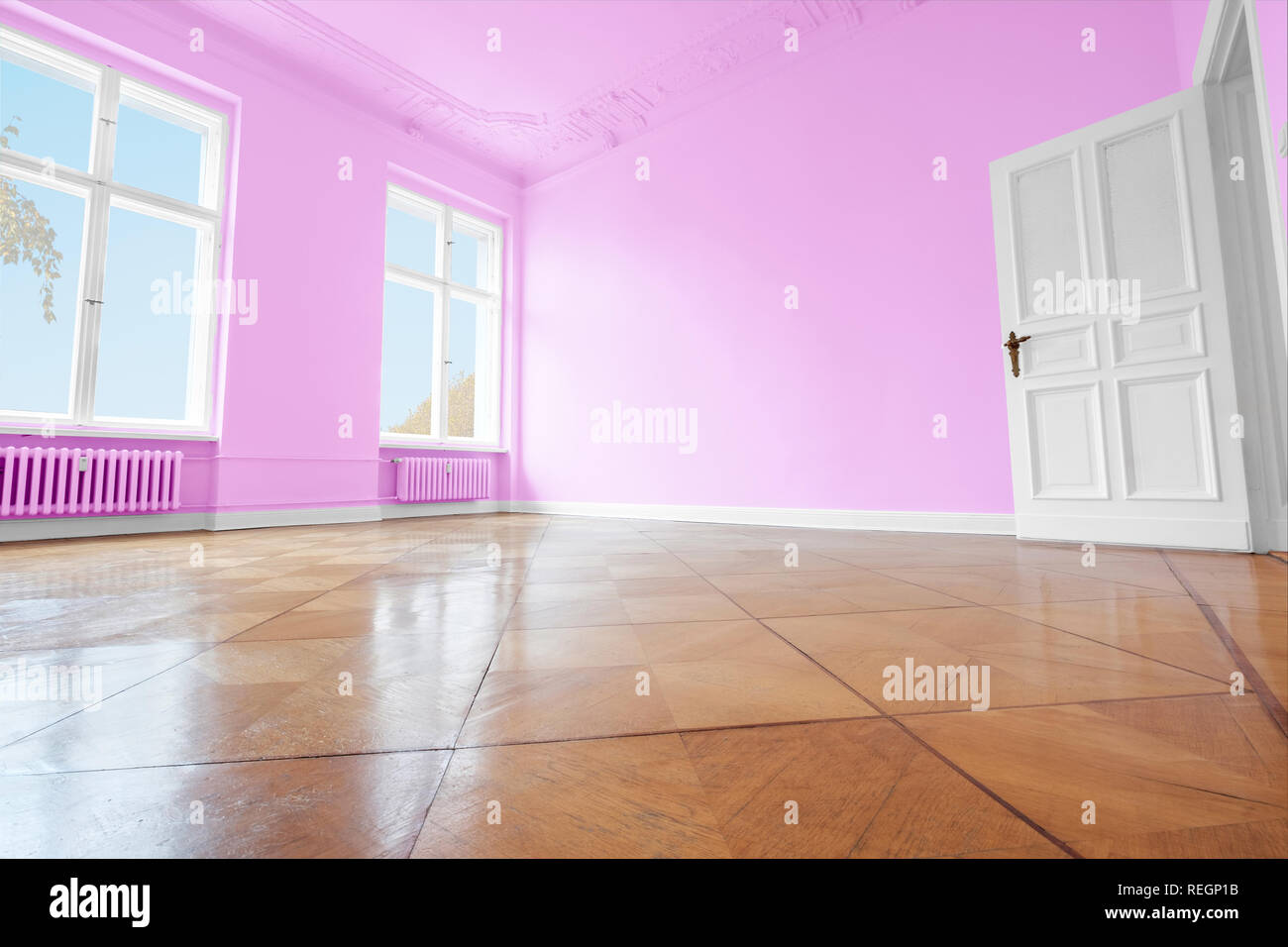 empty room with pink painted walls,  home renovation concept Stock Photo