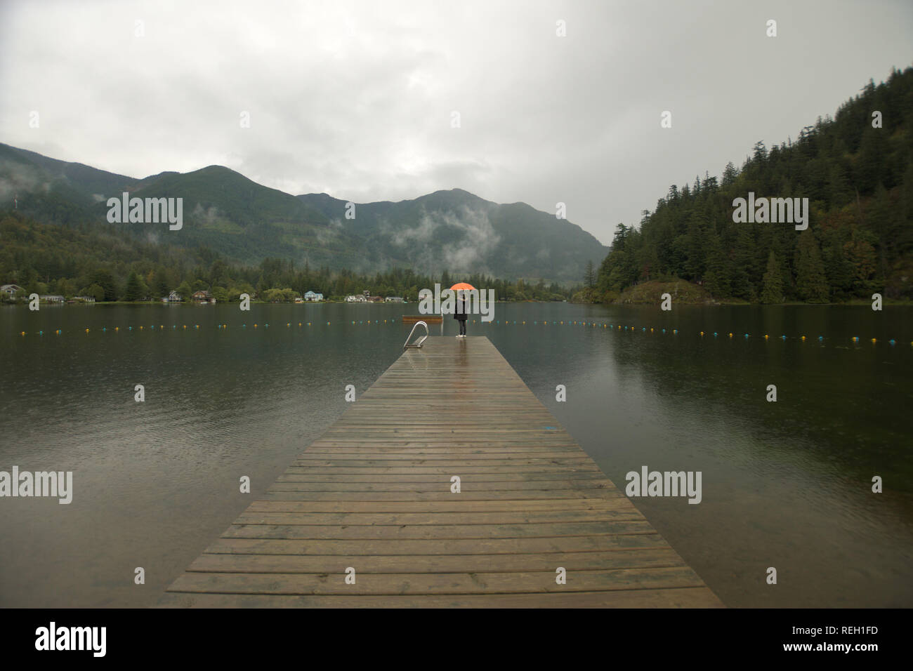 Rainy day on the dock at Lake Errock in Deroche, Mission, British Columbia, Canada Stock Photo