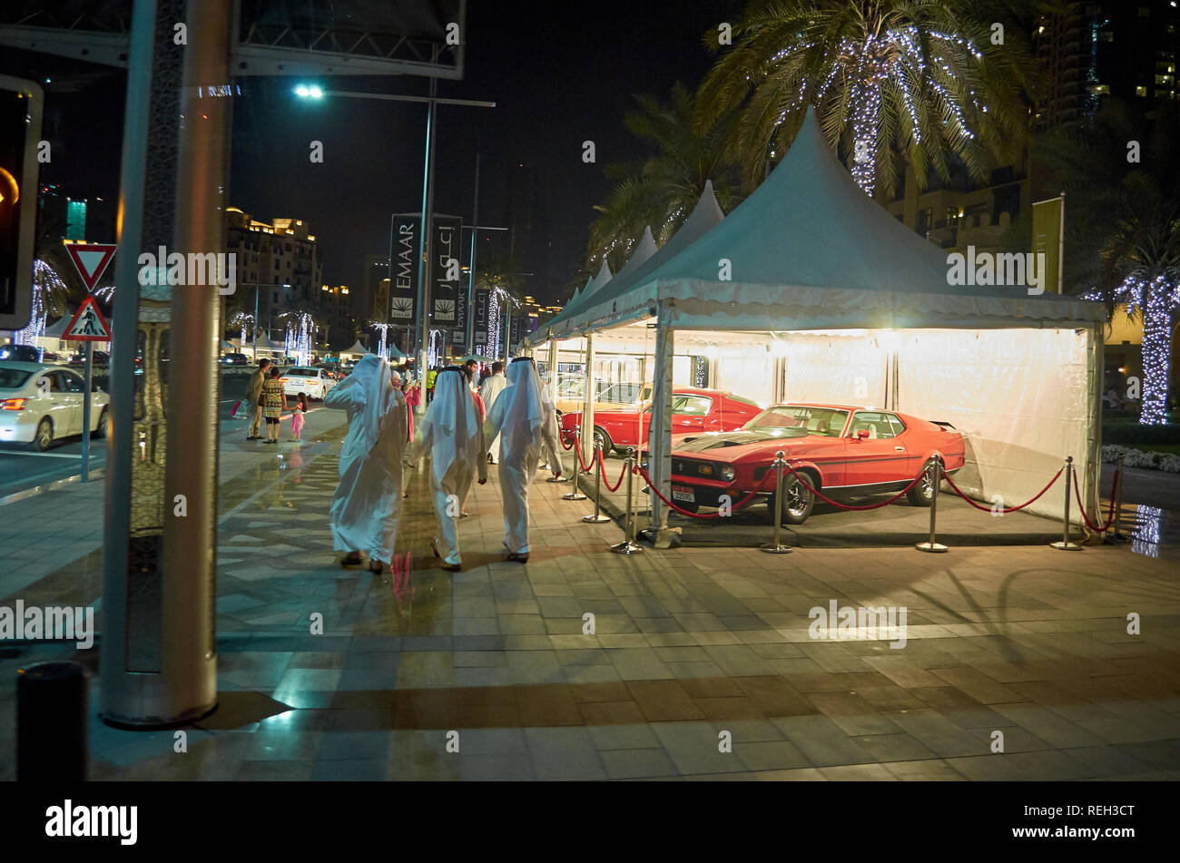 Night Life In Dubai City Arab Men Walking Wearing Kandoras