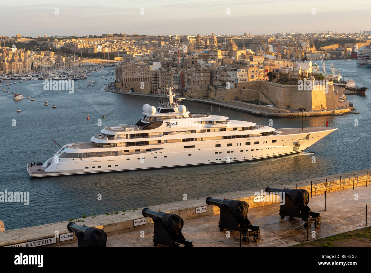super yacht Topaz entering the harbour at Valletta, Malta. One of the worlds largest privately owned yachts. Stock Photo