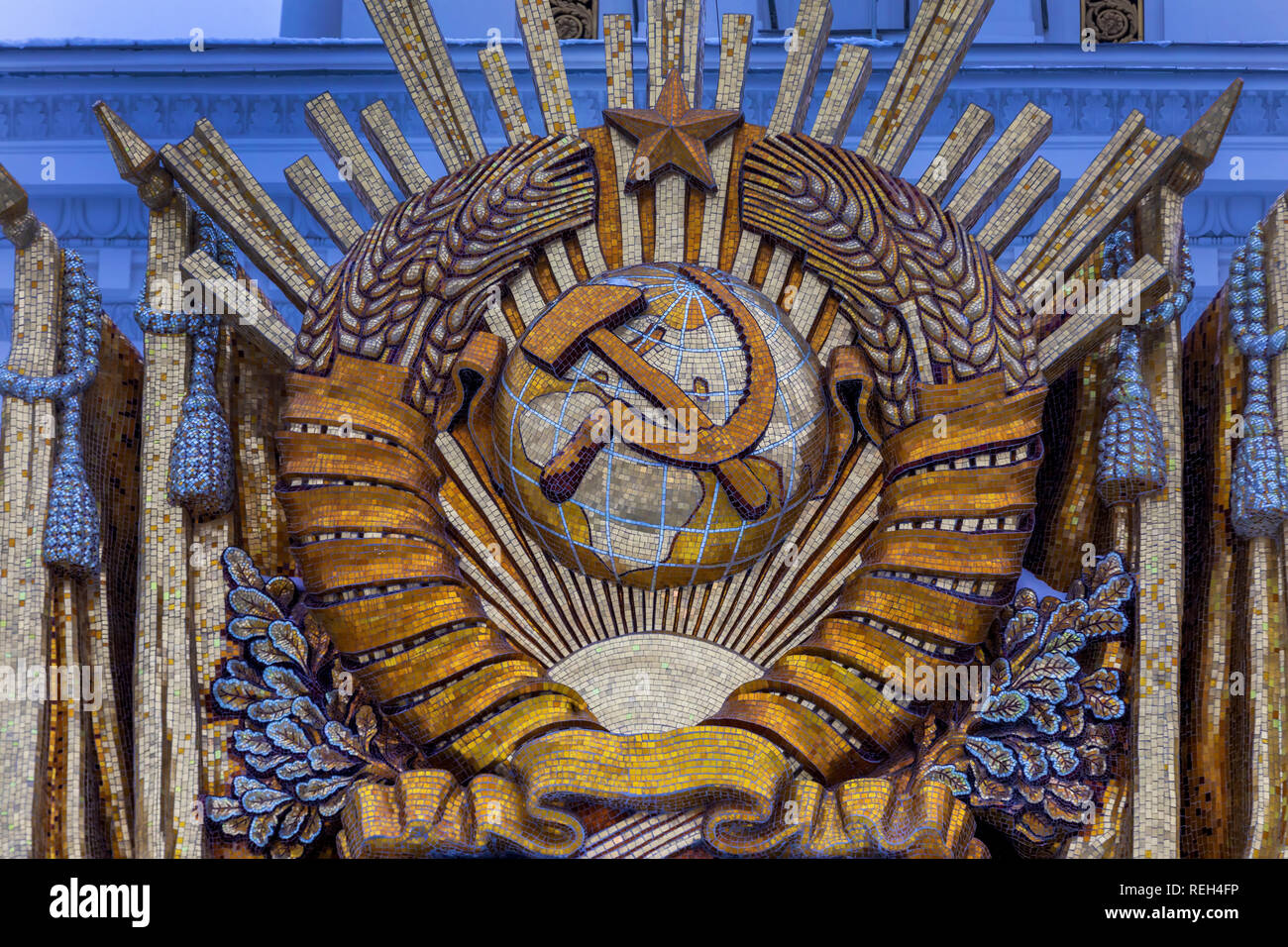 USSR coat of arms on the facade of pavilion No. 1 'Central' (main pavilion) at VDNH exhibition centre in Moscow, Russia Stock Photo