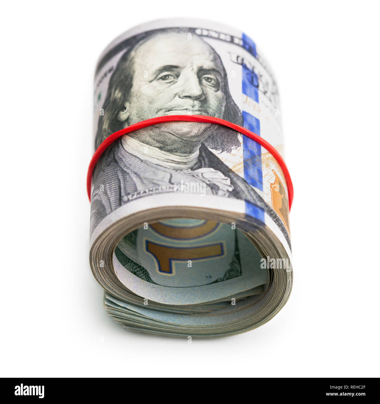 rolled one hundred dollars notes isolated on white background Stock ...
