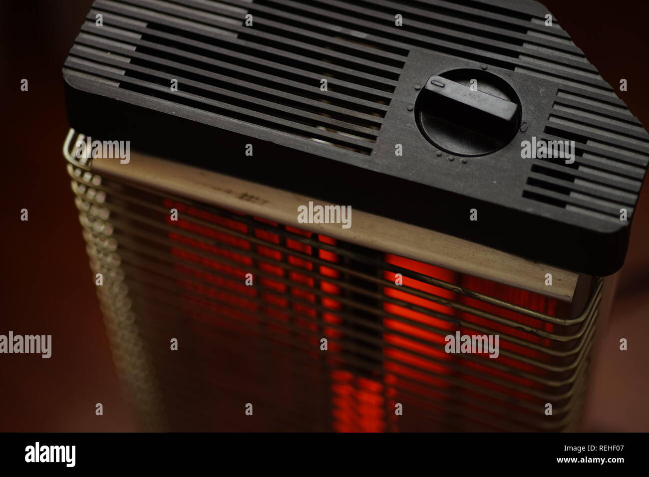 Vintage electric heater Ugolek with a burning lamp rod Stock Photo Alamy