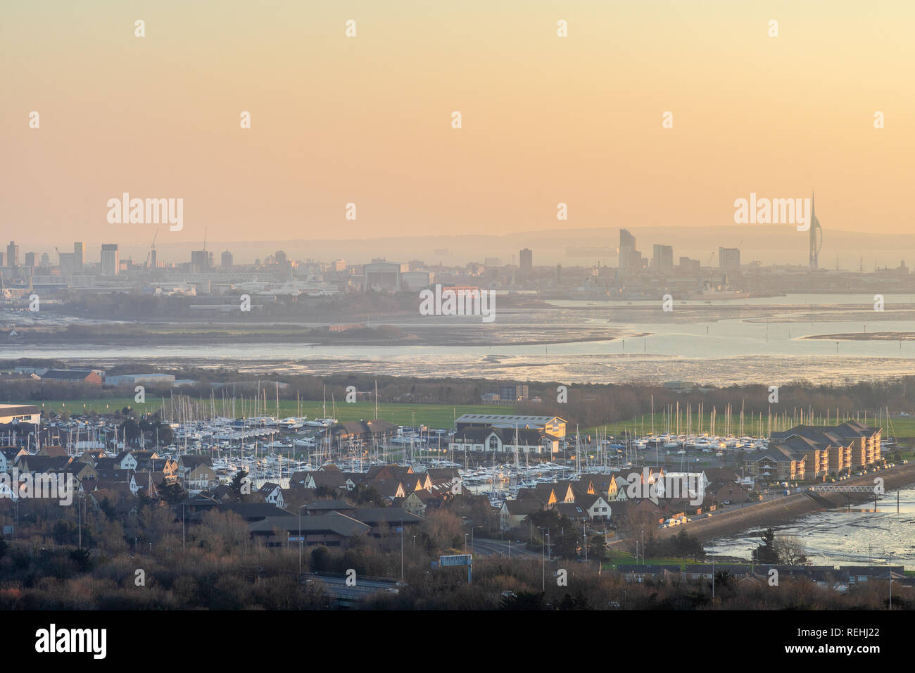 Sunset view from Portsdown Hill at dusk over Portsmouth and Port Solent and the Portsmouth skyline in the distance, Portsmouth skyline, Hampshire, UK Stock Photo