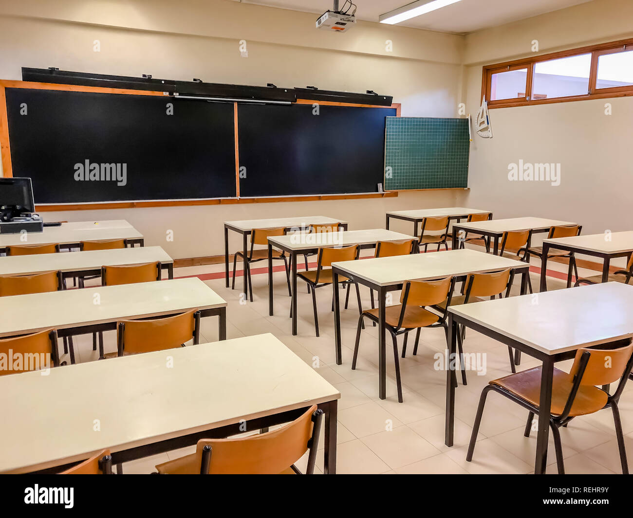 empty classroom without students in school chairs and desks Stock Photo