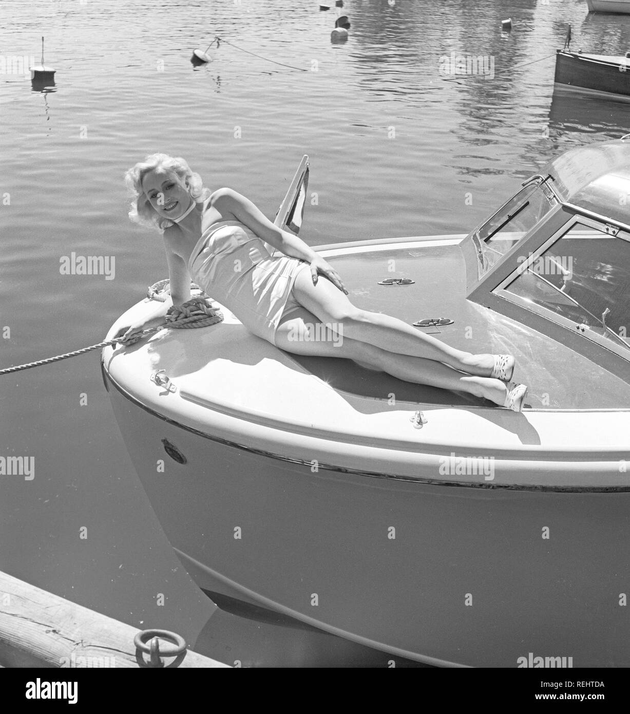 1950s swimsuit fashion. A swedish young woman in a bathing suit on a ...