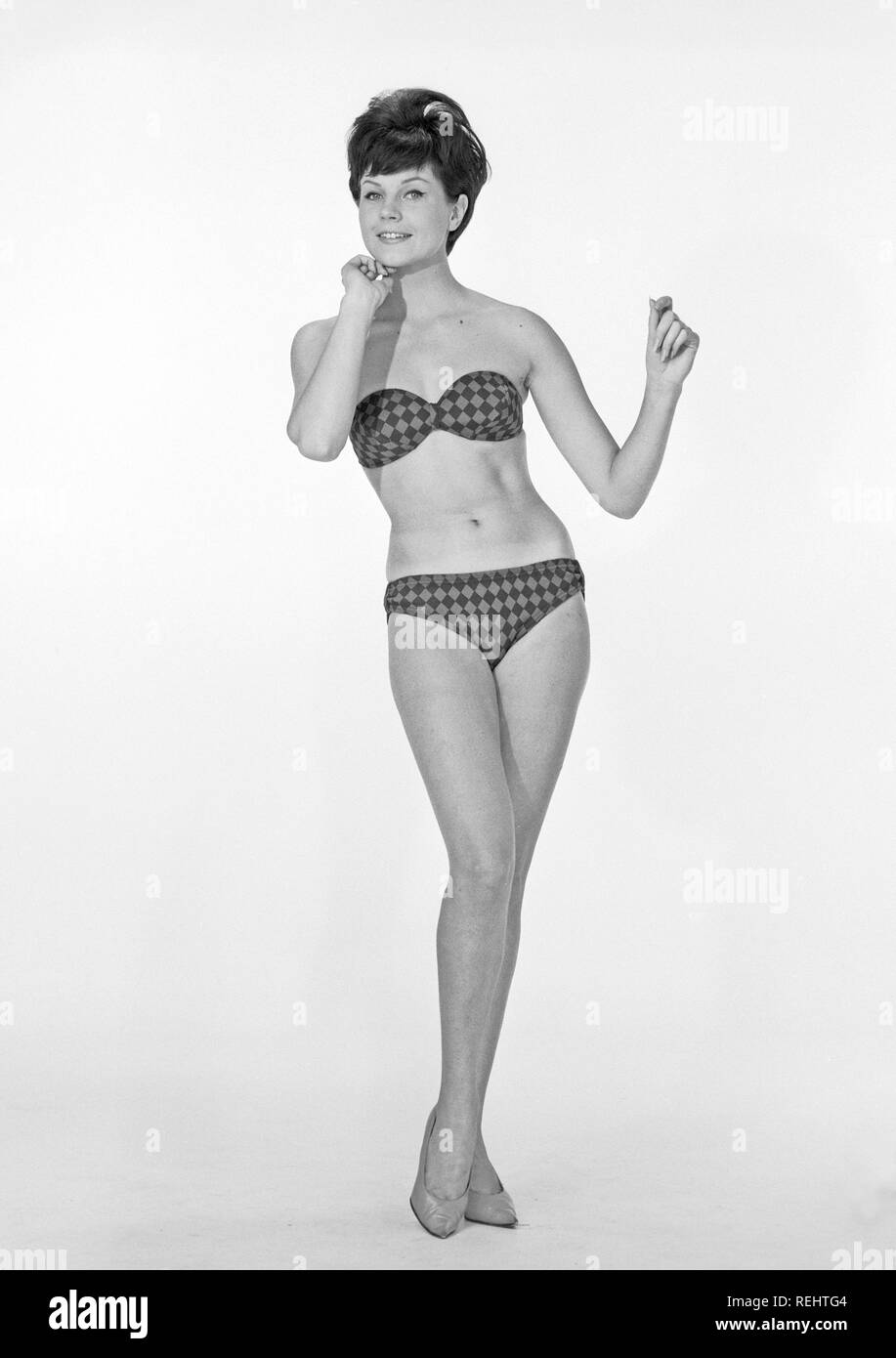 betray Communist tail 1960s bikini fashion. A blonde girl in a photographers studio in a typical 1960s  bikini. Sweden 1960s Photo Kristoffersson ref CP25-5 Stock Photo - Alamy