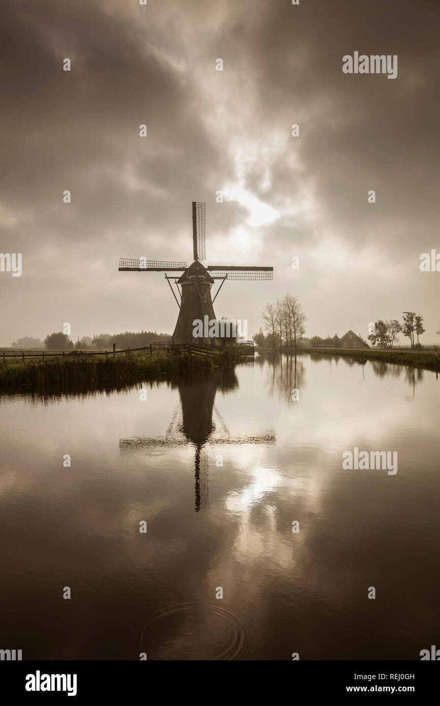 The Netherlands, Haastrecht, Vlist River, Windmill. Stock Photo