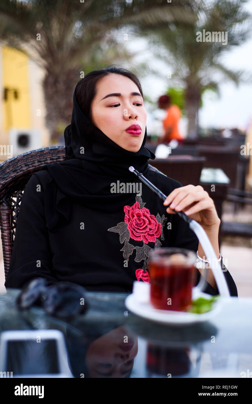 Muslim smoking cigarette hi-res stock photography and images - Alamy
