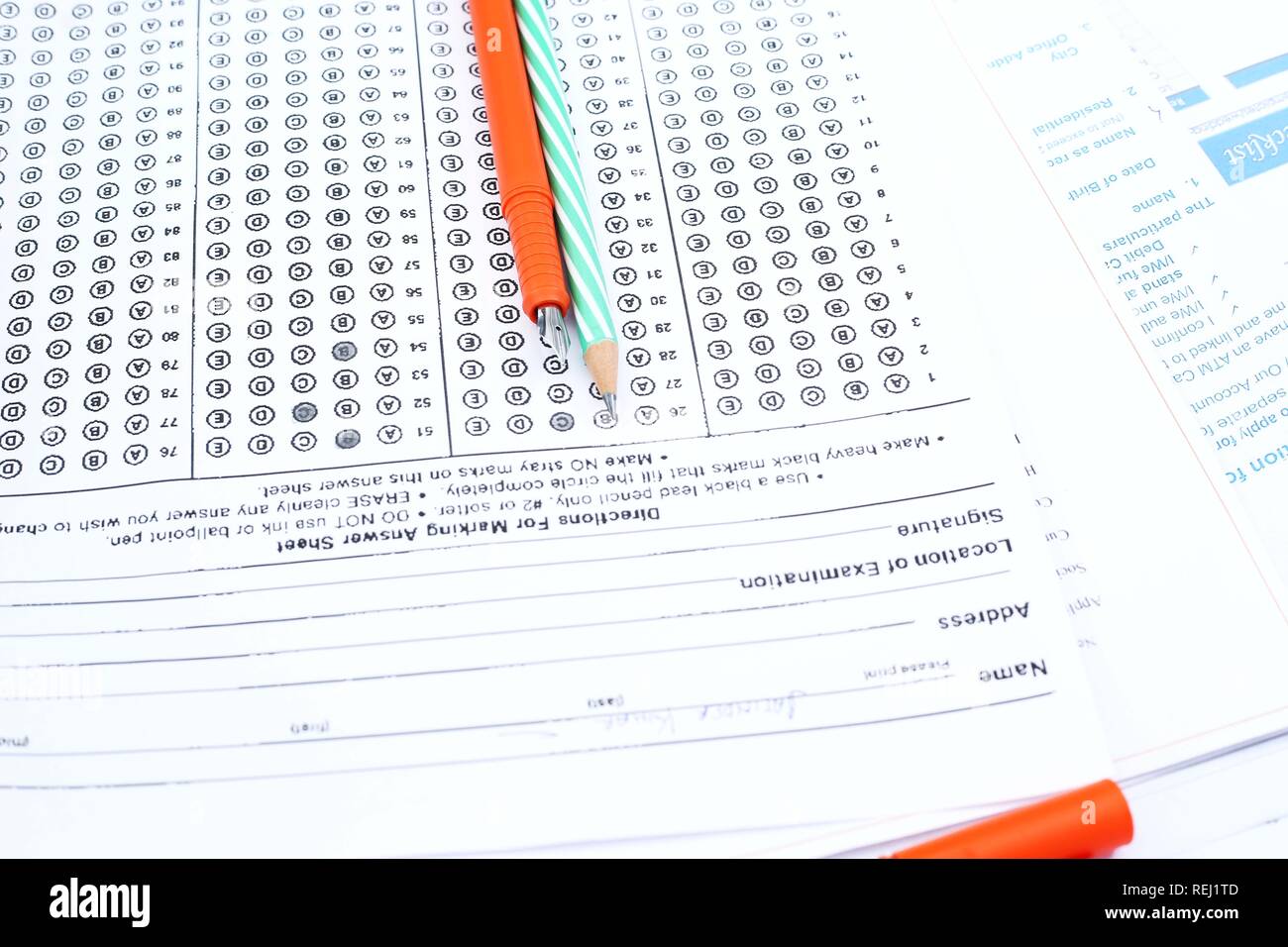 Picture of pen and pencil on the omr sheet. Stock Photo