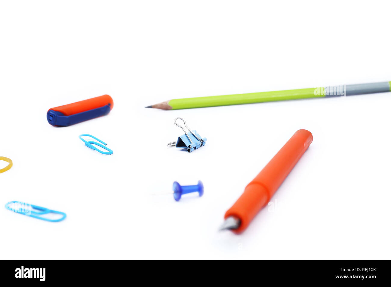 Picture of fountain pen, pencil and paper clip. Isolated on the white ...
