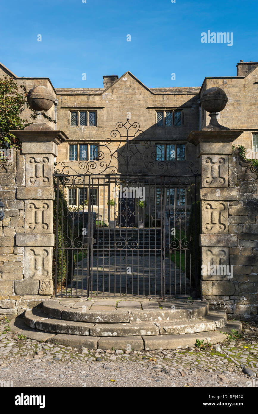 Eyam Hall in the historic village of Eyam in the Peak District, Derbyshire, England. Stock Photo