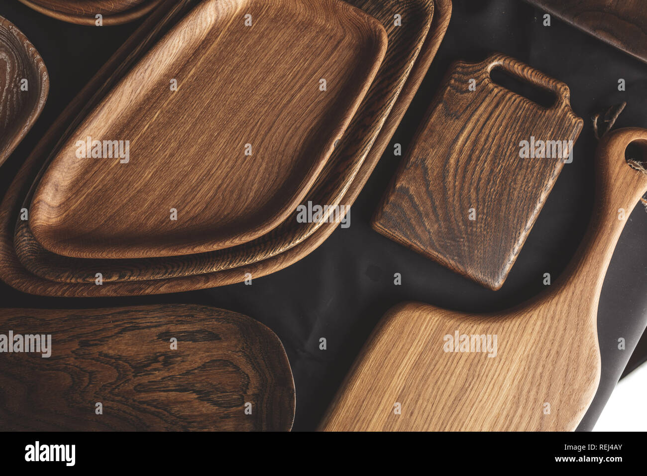 Set of cutting boards on wooden background Stock Photo