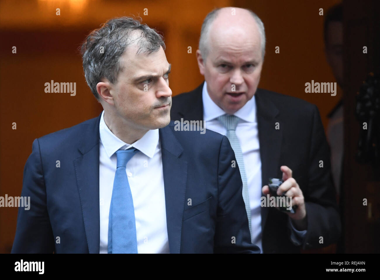 Chief Whip Julian Smith followed by press secretary Robbie Gibb leave 10 Downing Street, London, following a cabinet meeting. Stock Photo