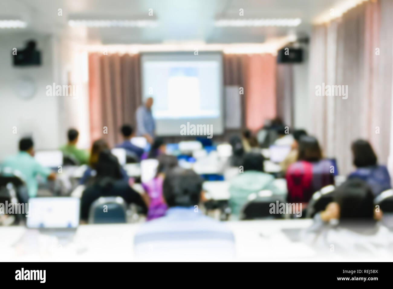 blurred people lecture in seminar room education or meetting concept ,abstract blur people background Stock Photo