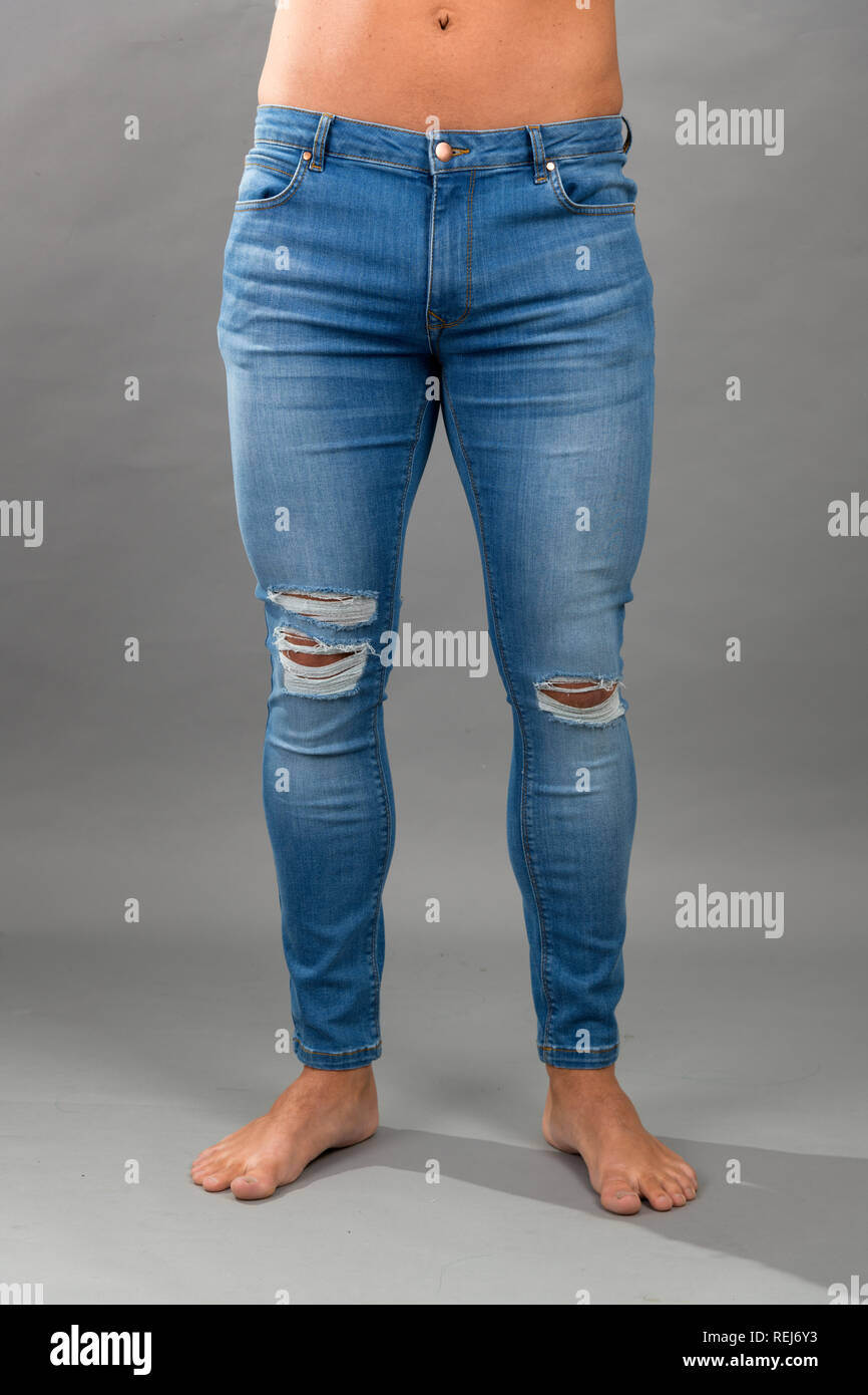 Ripped Jeans High Resolution Stock Photography And Images Alamy