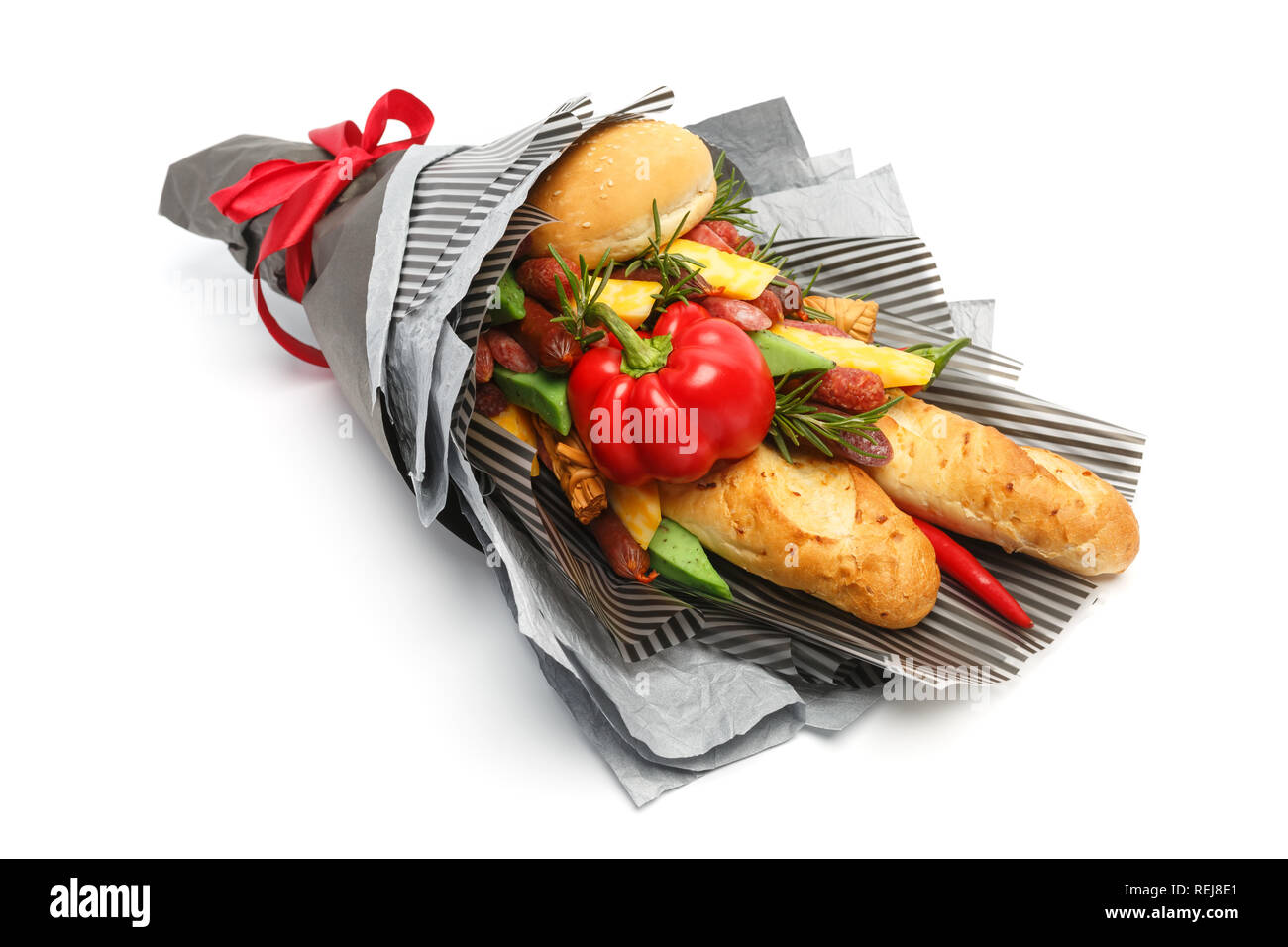 Wheat bread, sesame bun, cheese of different varieties, sausages and pepper are wrapped in gray paper as a gift bouquet on a white background. Side vi Stock Photo