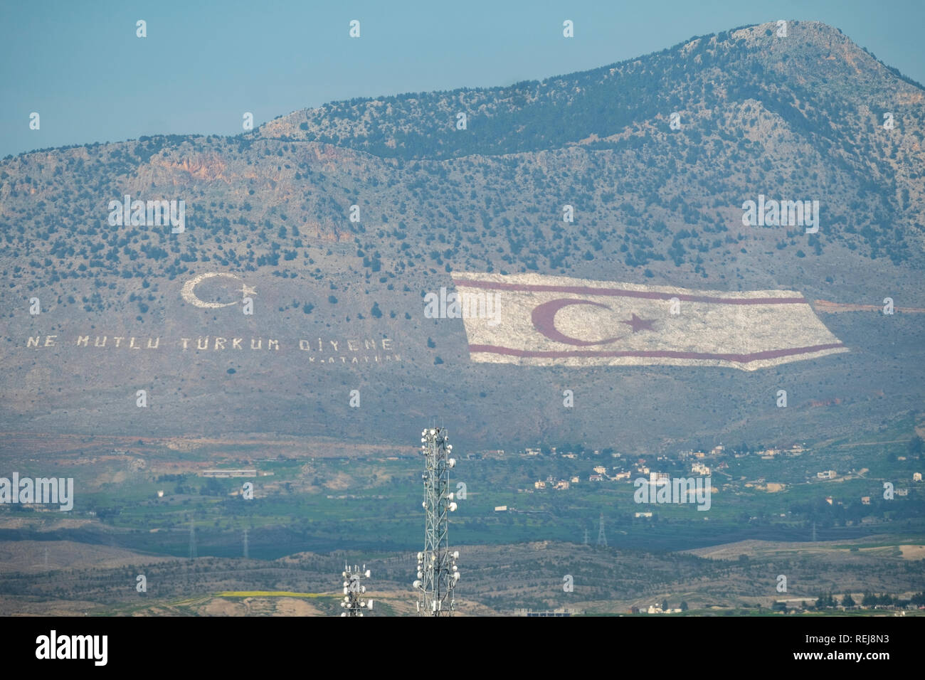A giant flag marked on the slopes of the south side of Kyrenian mountains facing Nicosia and the Republic of Cyprus Stock Photo