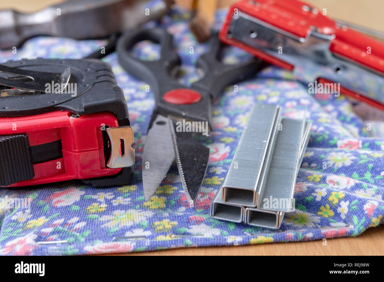 Tacker and Staples used to upholster furniture. Accessories for