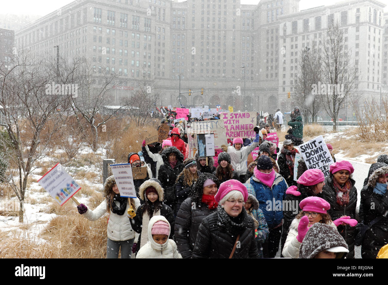2019 Women's March participants rally on Public Square in downtown Cleveland, Ohio, USA during a winter snowstorm. Stock Photo