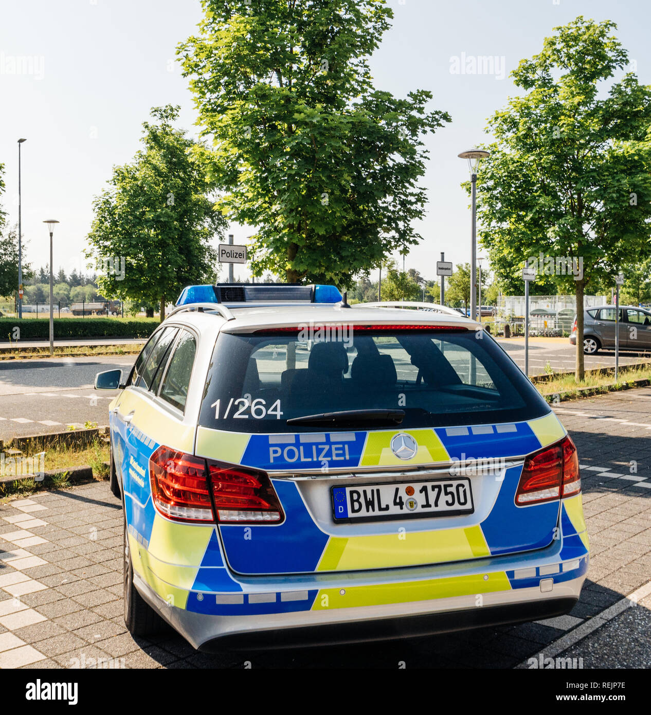BADEN, GERMANY - MAY 11, 2018: Rear view of Polizei Police car Mercedes-Benz blue car parked in front of Karlsruhe Baden-Baden Airport (IATA: FKB, ICAO: EDSB) Stock Photo