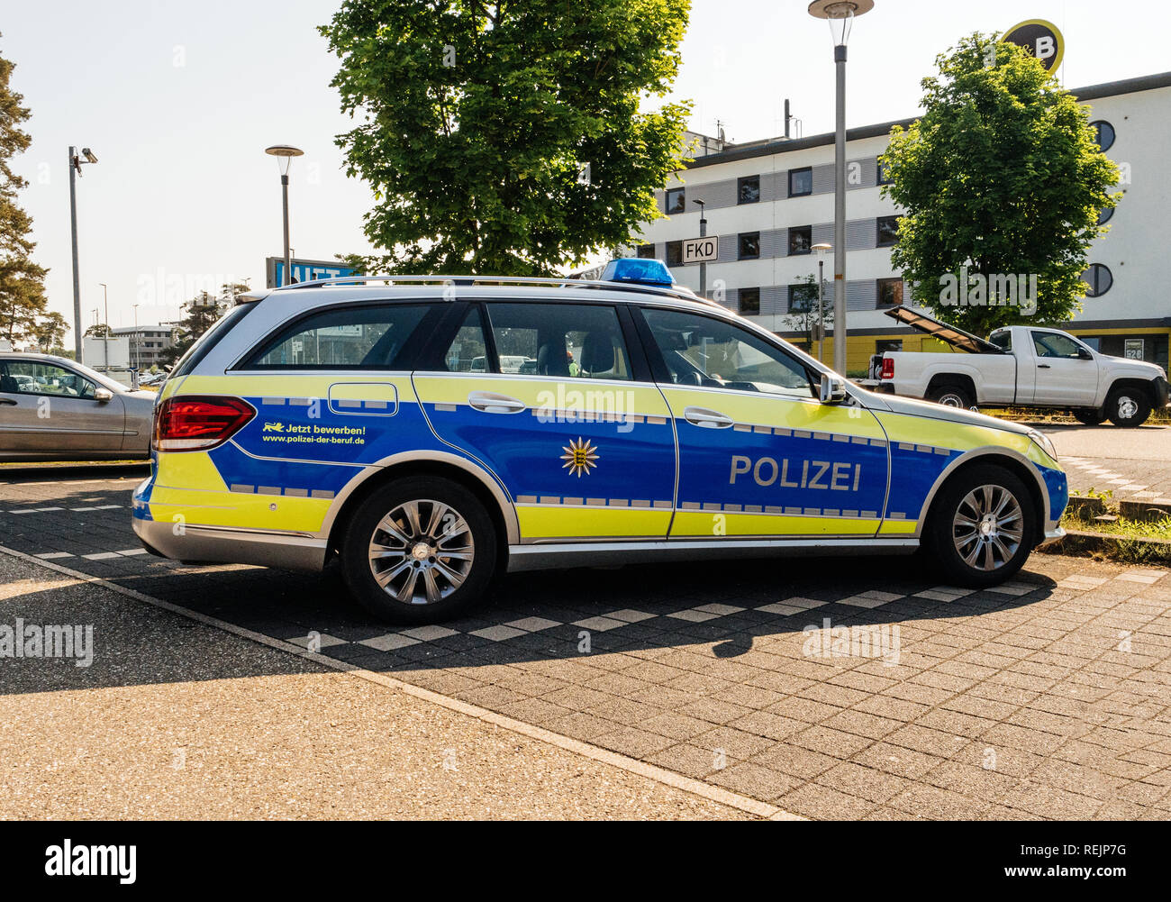BADEN, GERMANY - MAY 11, 2018: Polizei Police car Mercedes-Benz blue car parked in front of Karlsruhe Baden-Baden Airport (IATA: FKB, ICAO: EDSB) Stock Photo