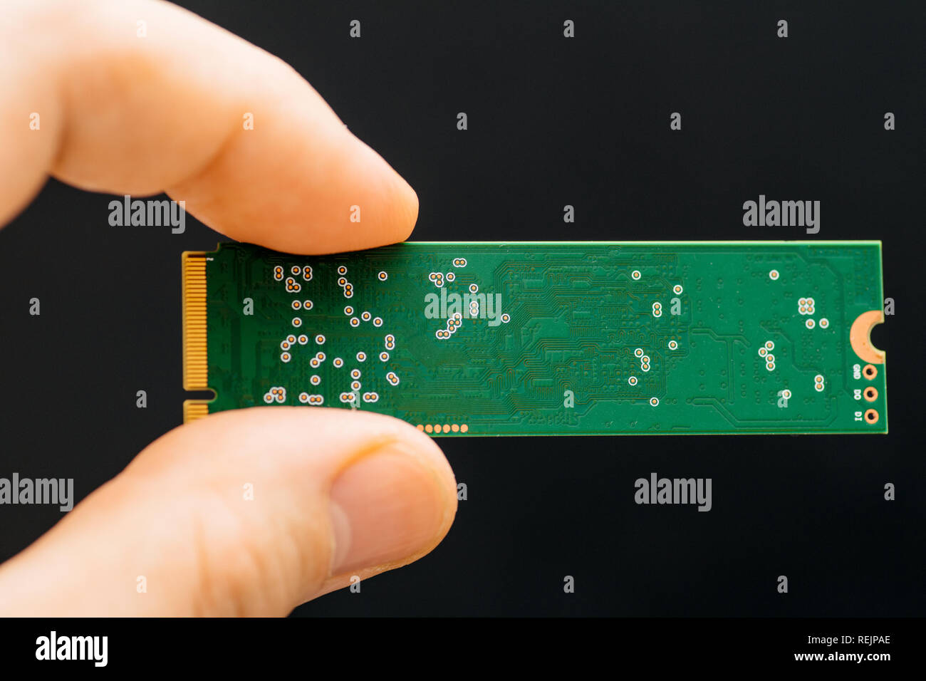 Man hand holding NVME PCIE SSD hard drive disk with high read and write