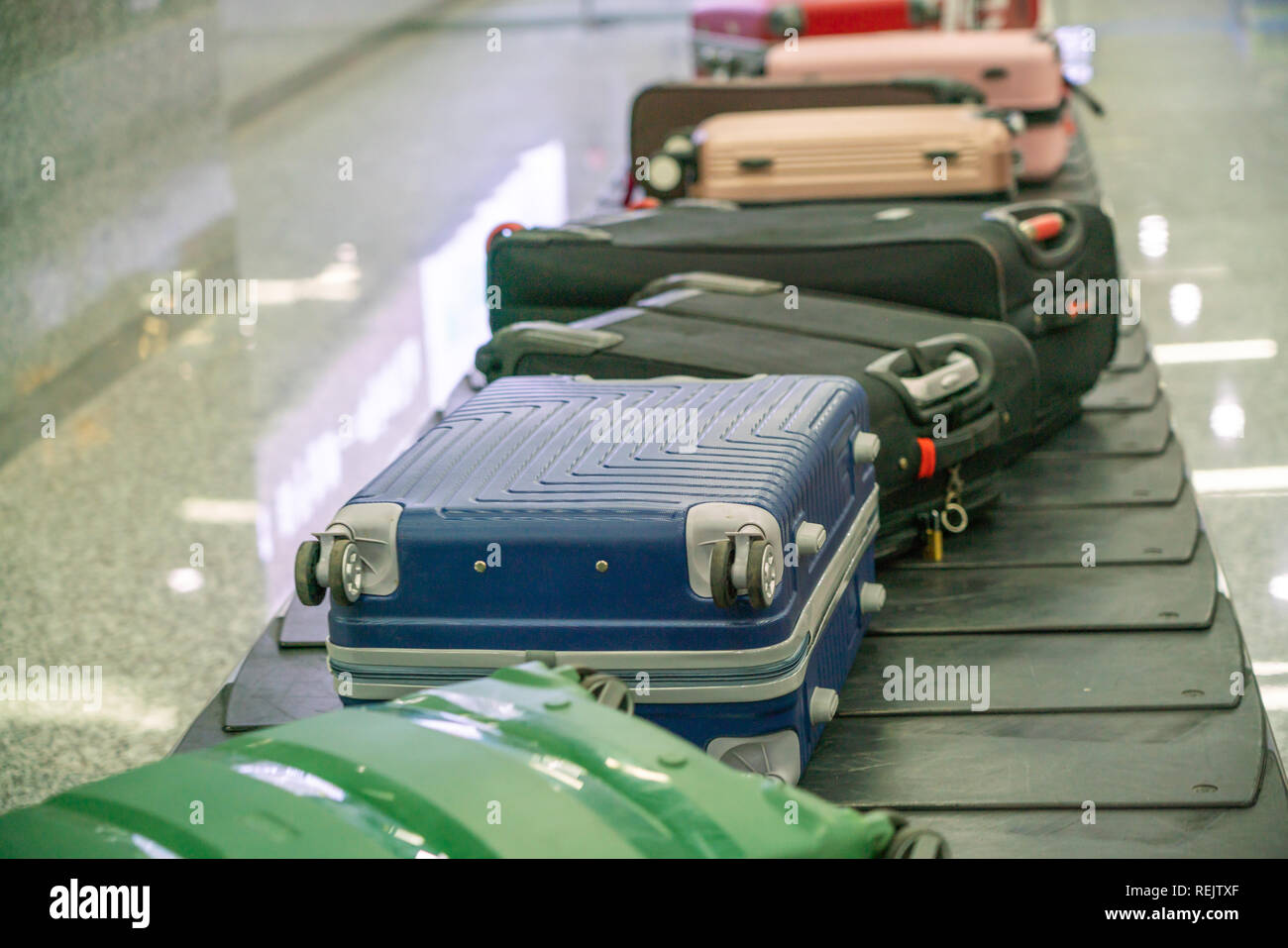 Suitcases on Baggage Claim Conveyor Belt at Airport Stock Photo Alamy