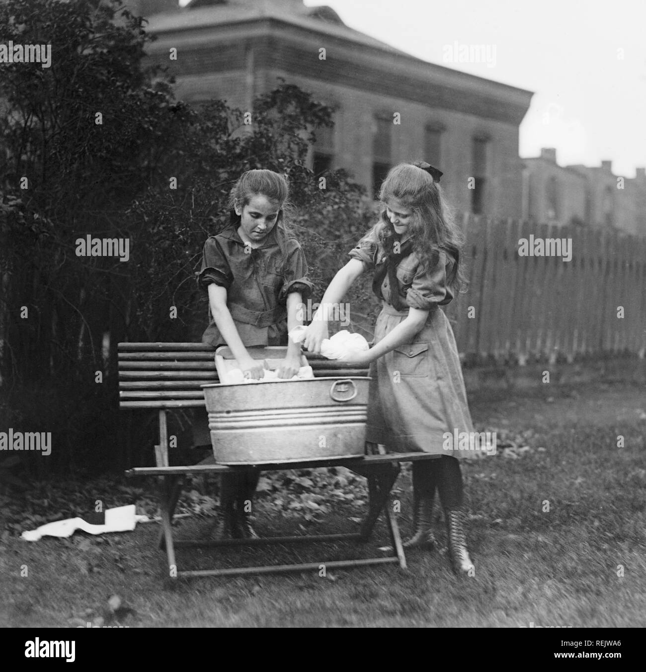 Two Girl Scouts Washing Clothes, Washington DC, USA, National Photo Company, 1920 Stock Photo