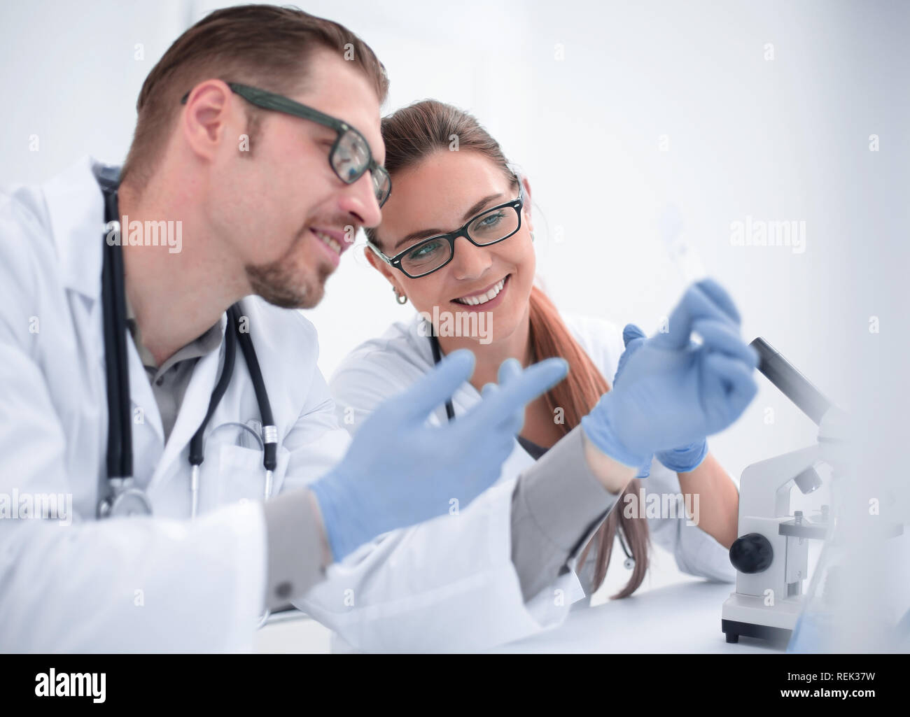 Two scientists conducting science experiment hi-res stock photography ...