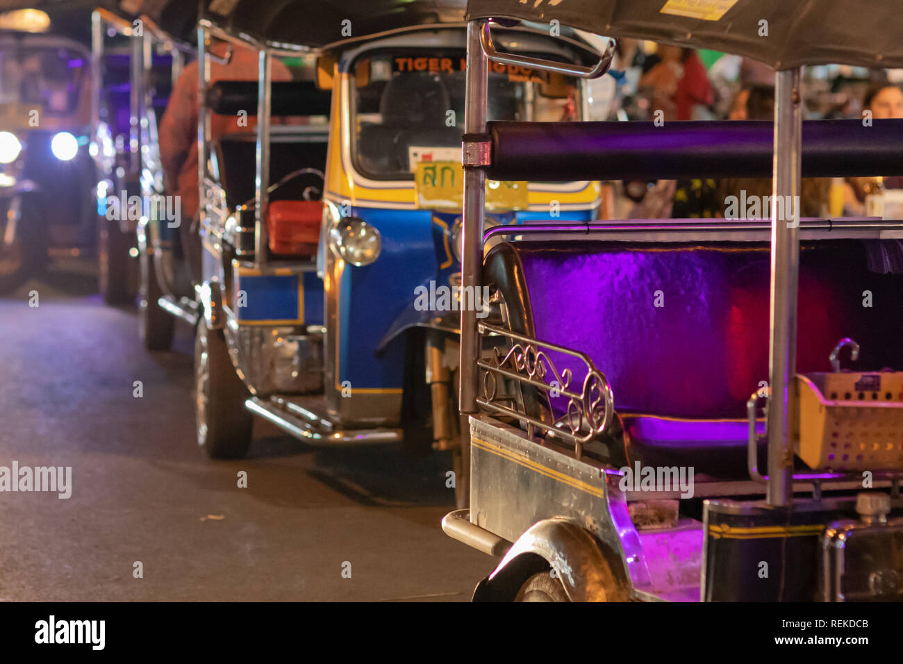 Mueang Chiang Mai, Chiang Mai, Thailand - January 05, 2019: Tuk-tuks lined up waiting on passenges outside of the night market. Stock Photo